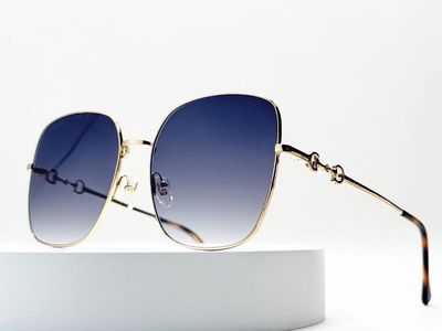 Gucci GG0879S Oversized Square Sunglasses Gold Frame Blue Gradient Lens