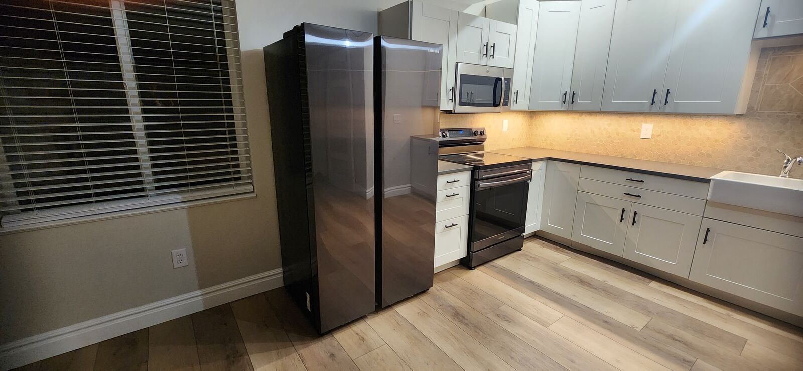 Samsung 22.6 cu. ft. Smart Counter-Depth Side-by-Side Refrigerator - Black Stainless