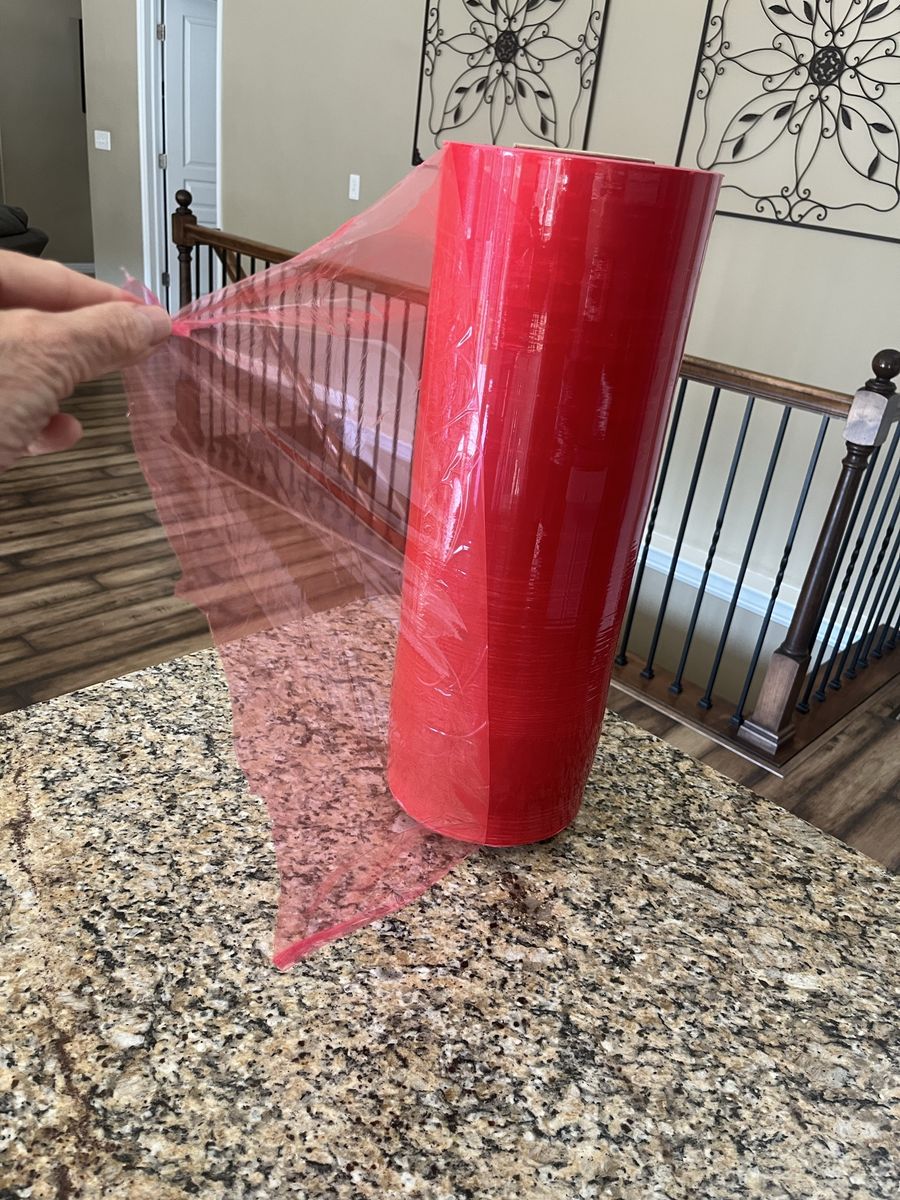 New Huge Red Plastic Wrap Roll - 20 1/2Inches wide.
