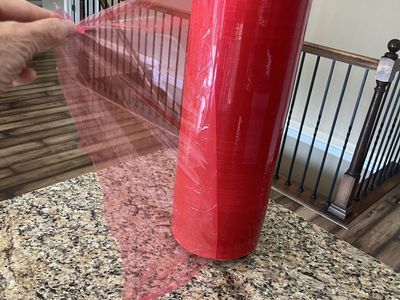 New Huge Red Plastic Wrap Roll - 20 1/2Inches wide.
