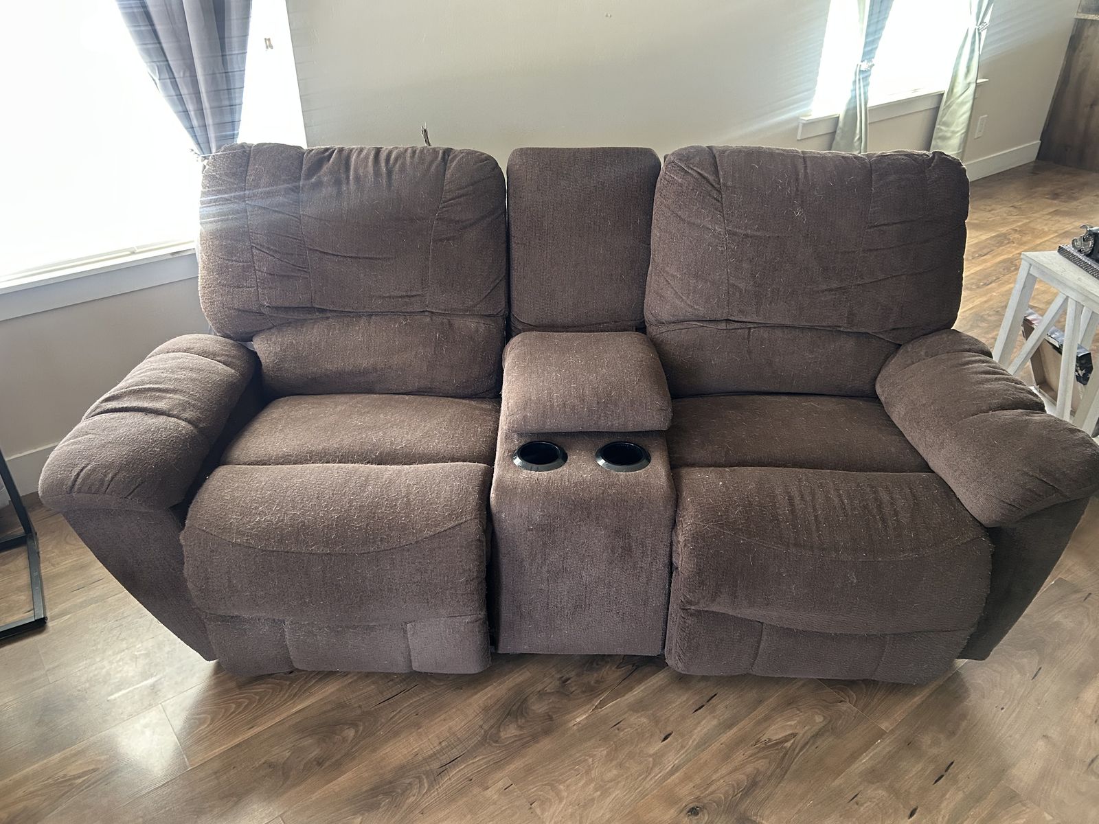 Brown Fabric Reclining Loveseat with Center Console and Cup Holders