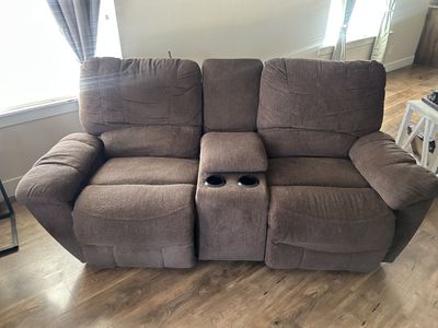 Brown Fabric Reclining Loveseat with Center Console and Cup Holders