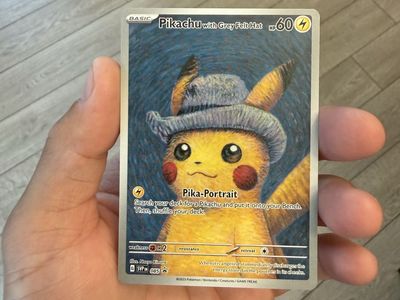 Pikachu grey felt hat and magikarp paldea evolved