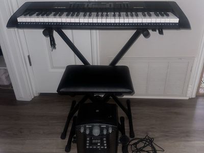 Alesis Bravo 61 Electronic Keyboard with Stand, and bench.