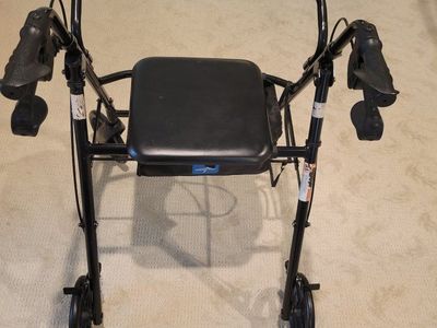 Medline Folding Four-Wheel Rollator Walker with Seat and Storage Pouch - Black