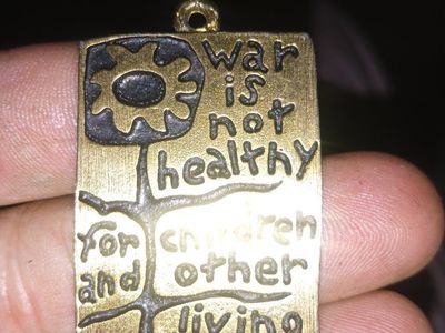 Vintage "War Is Not Healthy For Children" 1968 Peace Pendant, Gold Tone, Beverly Hills, CA