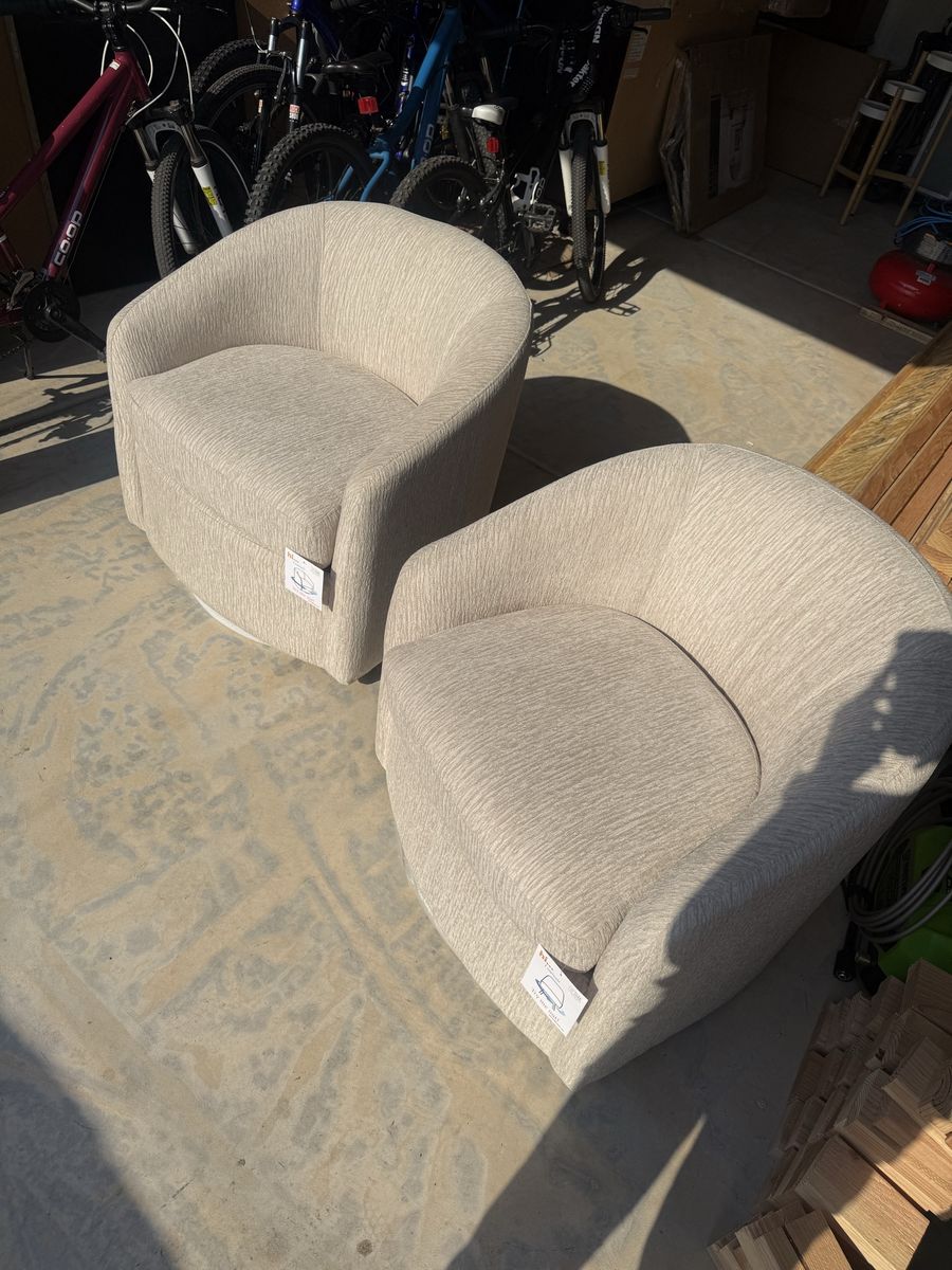 2 Swivel Barrel Chairs
