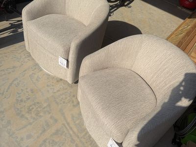 2 Swivel Barrel Chairs