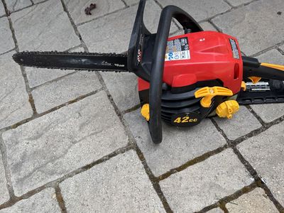 Homelite 42cc 14” chainsaw runs great, with extra new chain, new bar and misc items,