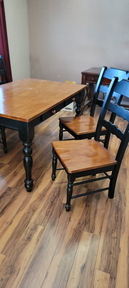Black and Wood Dining Table with Matching Chairs