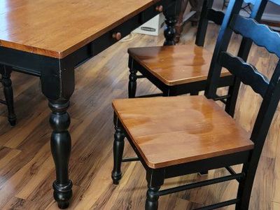 Black and Wood Dining Table with Matching Chairs
