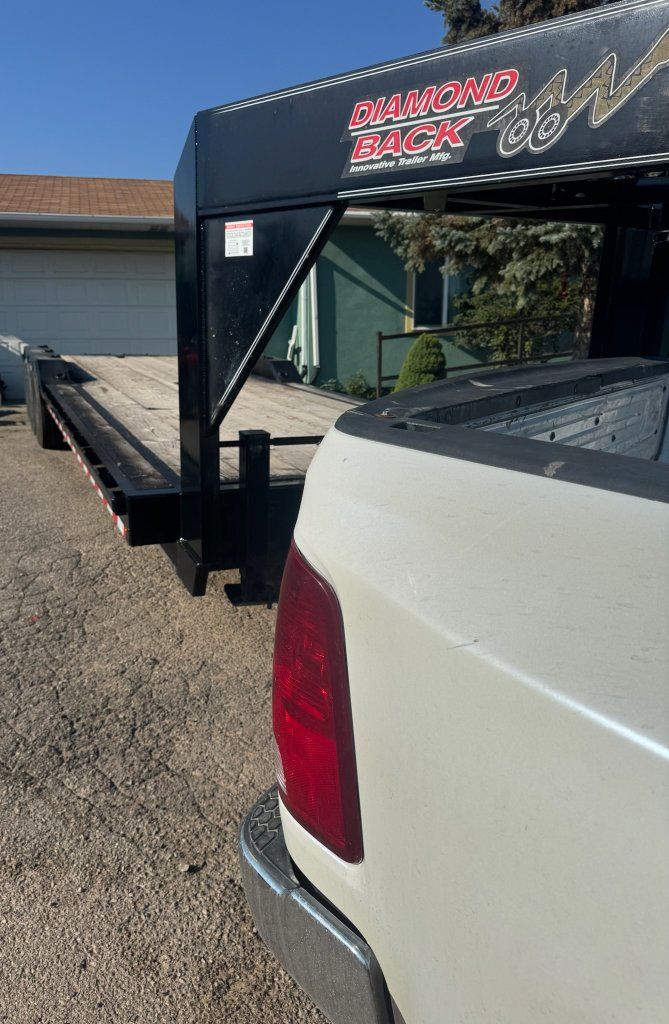 2012 Diamond Back Triple Axle Gooseneck Trailer