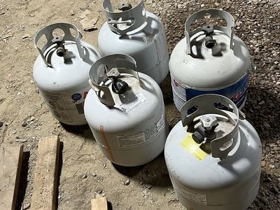5 Propane Tanks - (Sell the lot of 5 for $140. or $40 each on the full tanks and $15 on the half full or empty