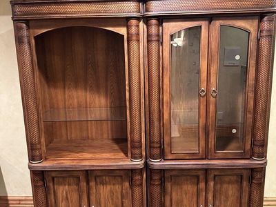 Two wood Cabinets in excellent condition. Two pieces, not one large piece as shown.