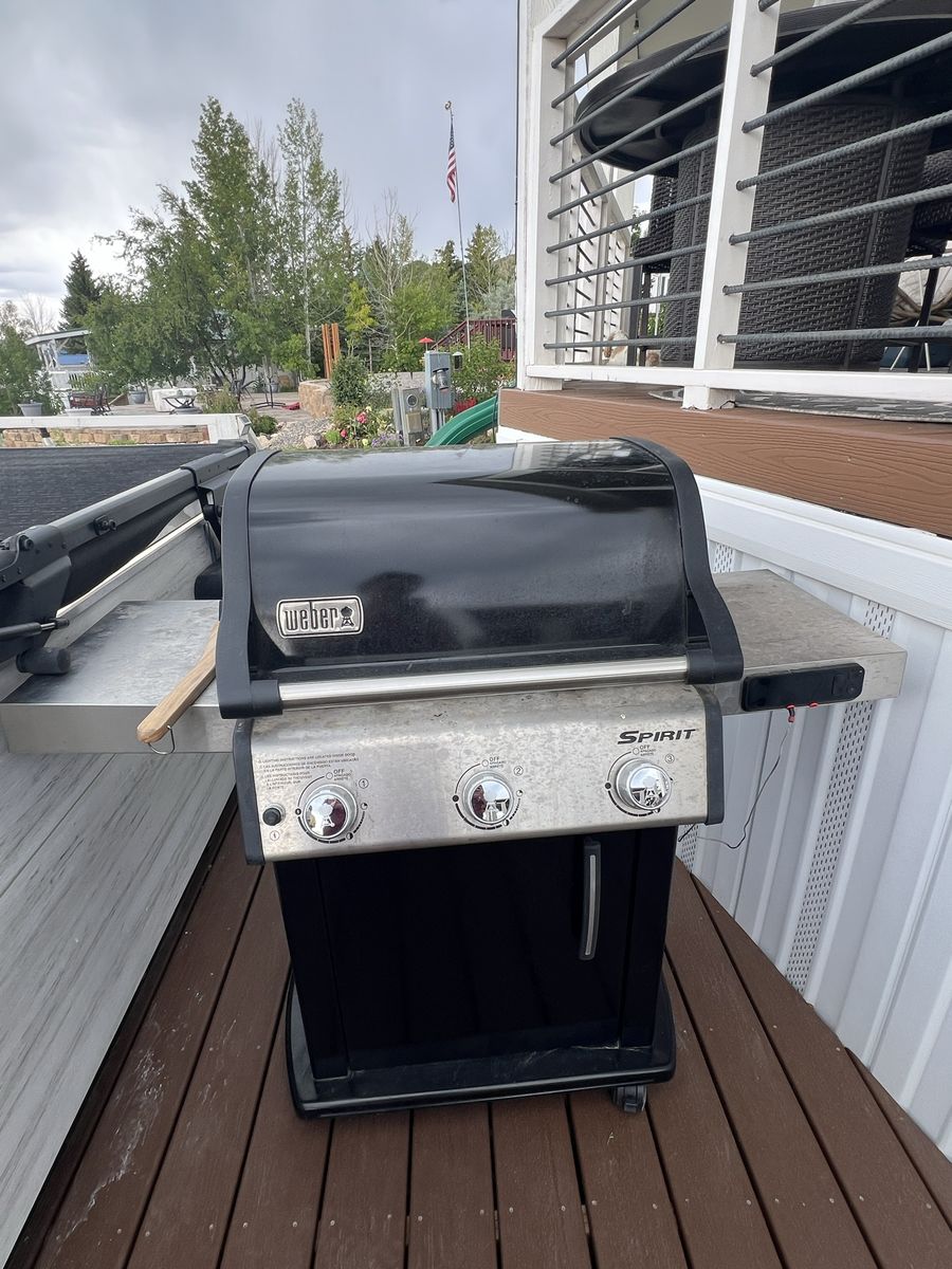 Weber Spirit 3-Burner Liquid Propane Gas Grill with Side Burner and Side Tables