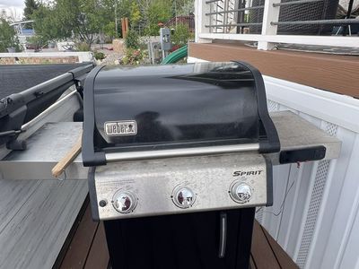 Weber Spirit 3-Burner Liquid Propane Gas Grill with Side Burner and Side Tables