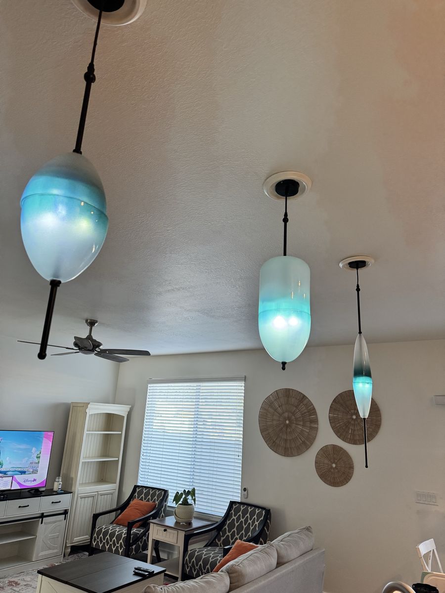 3 blue hanging lights fixtures
