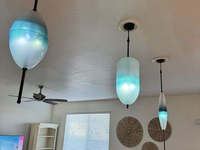 3 blue hanging lights fixtures