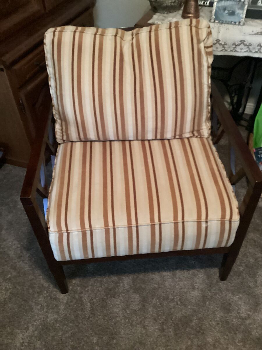 Brown wooden chair with stripped cloth cushions - $50.00
