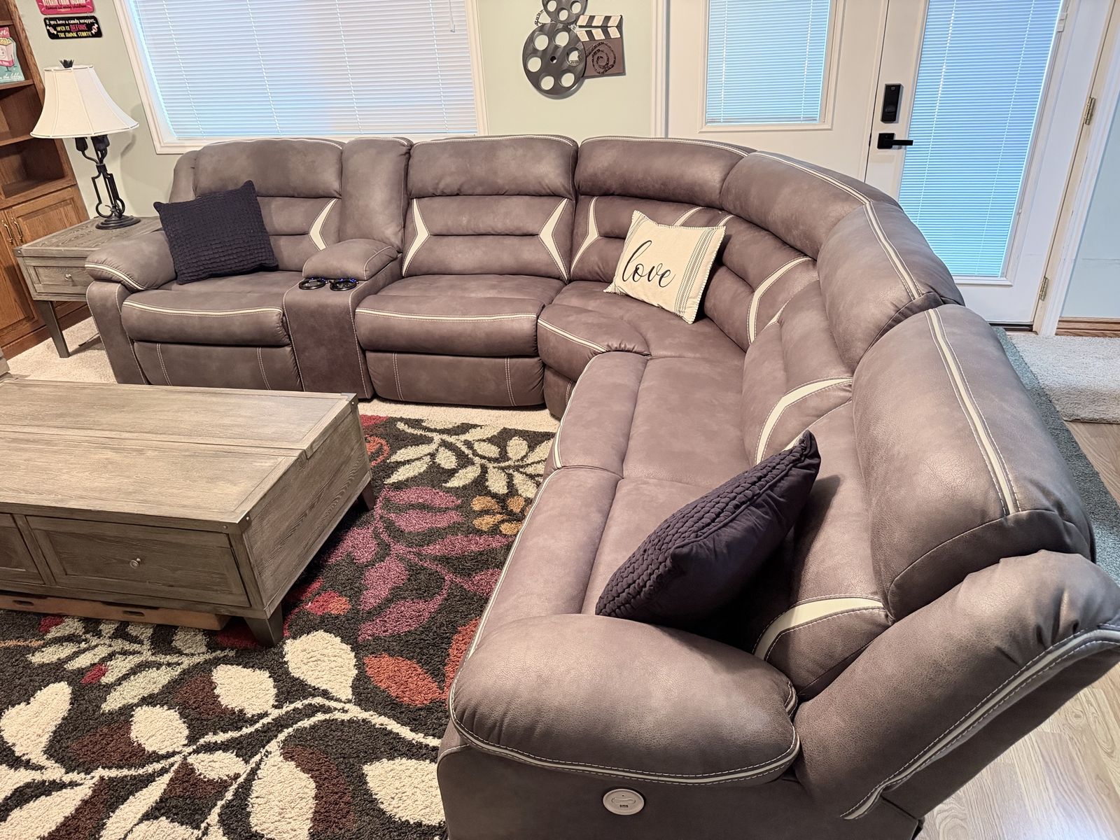 Reclining sectional with charging ports