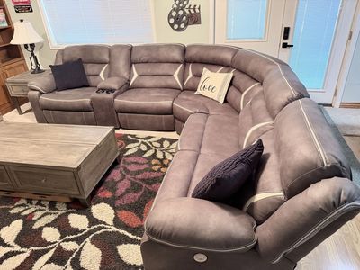 Reclining sectional with charging ports
