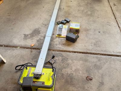 Complete Ryobi wifi belt drive wifi garage door opener with lots of options.