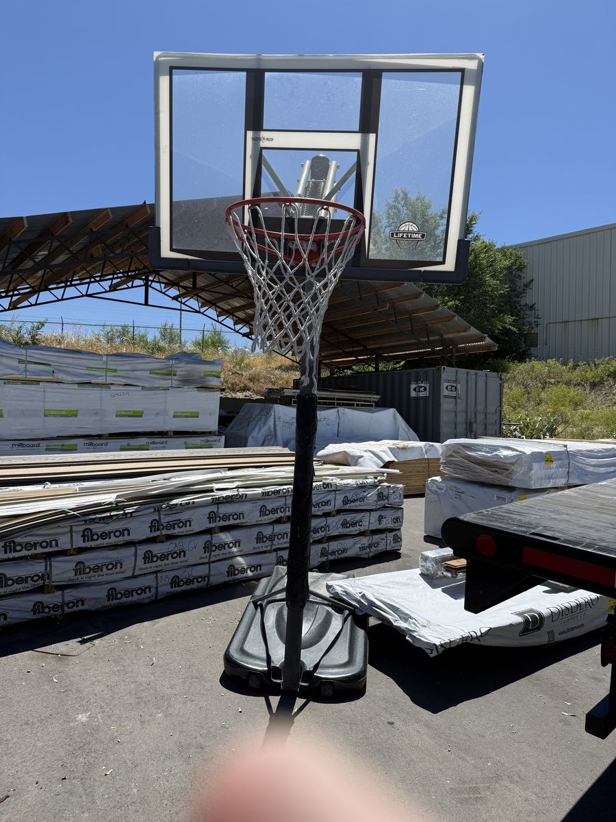 Lifetime Portable Basketball Hoop - Adjustable Height & Shatterproof Backboard