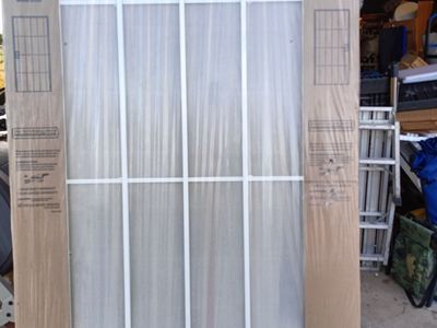 New 36 inch metal security screen door, white.