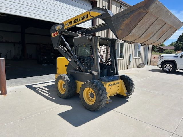 2007- New Holland HI lift Skid steer L185