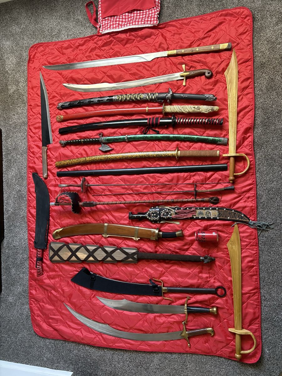 21 sword LOT: katanas, Arabian, medieval, machete, and a host of others.