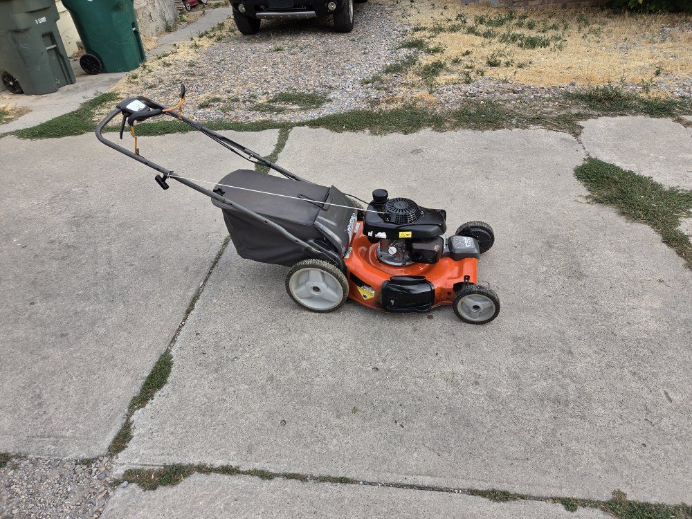 Husqvarna Gas Lawn Mower with Grass Bag self propelled. 