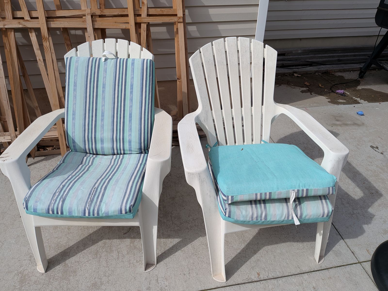 White plastic Adirondack chairs