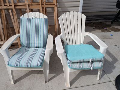 White plastic Adirondack chairs
