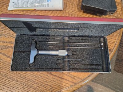 Starret depth micrometer.
