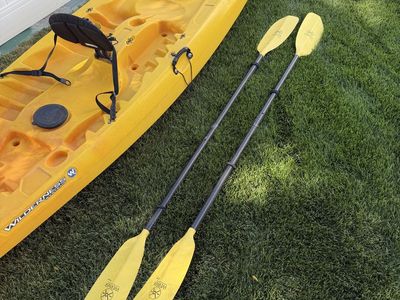 Wilderness Systems Tarpon 130T Tandem Kayak, Paddles and Yakima saddles.