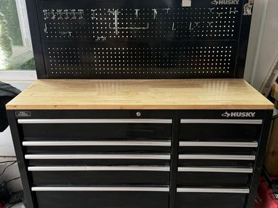 Husky 52-inch 9-Drawer Black Mobile Workbench Toolbox with Solid Wood Top and Pegboard