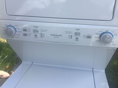 STILL IN NEW CONDITION FRIGIDAIRE LARGE CAPACITY WASHER AND DRYER. INCLUDES FREE DELIVERY