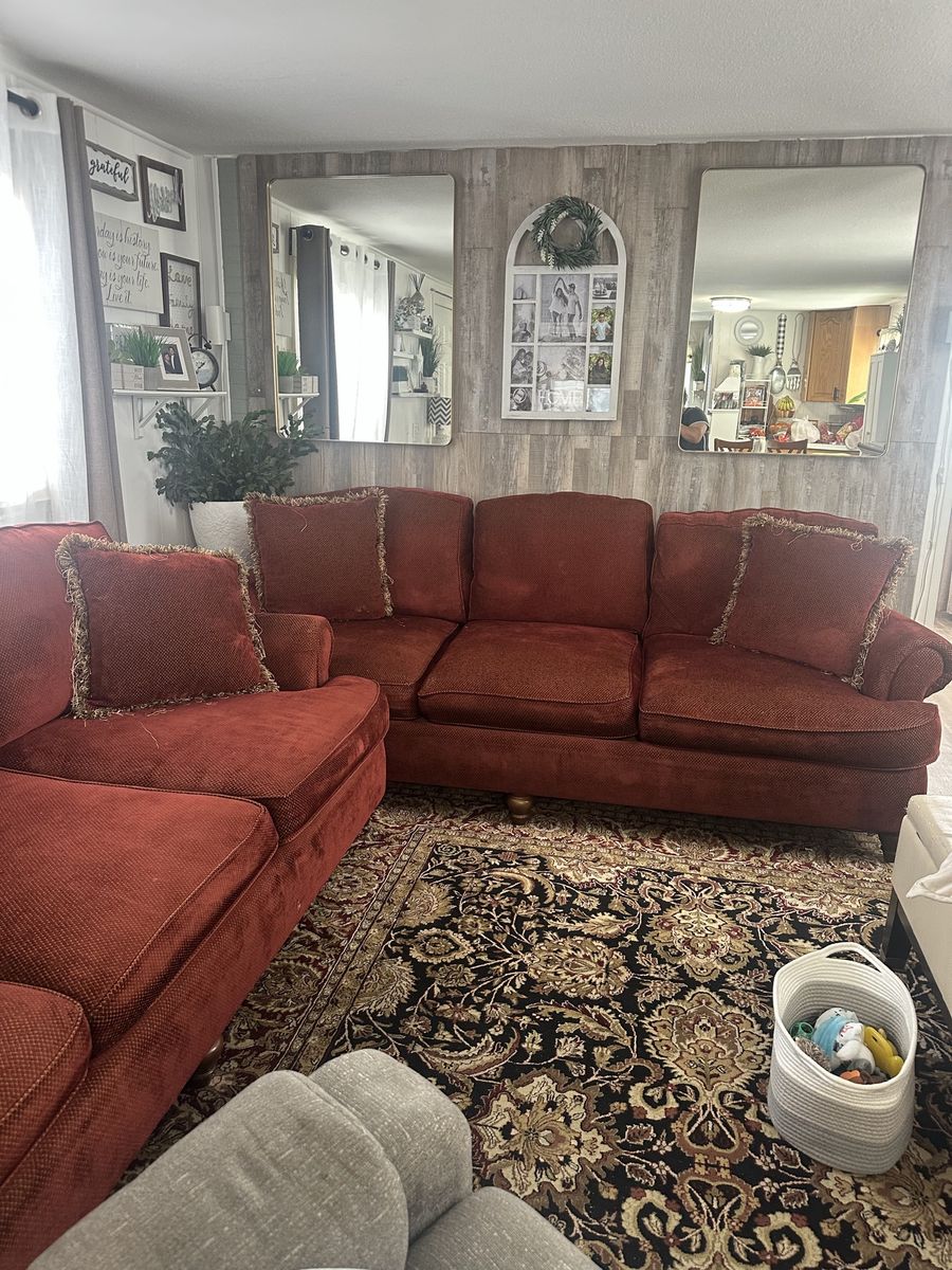 2 red Bernhardt sofas