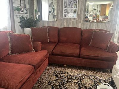 2 red Bernhardt sofas