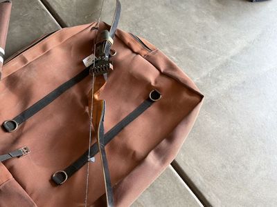Pack topper and hand made recurve bow.