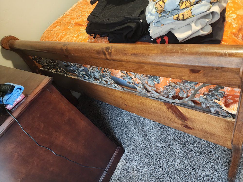 Wooden Queen Sleigh Bed Frame with Intricate Metalwork & Matching Nightstand and Dresser