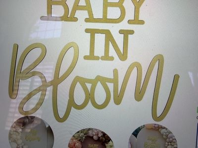 Baby in bloom sign
