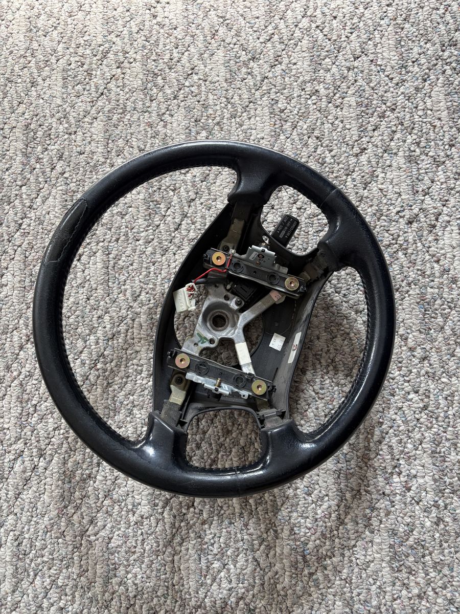 STEERING WHEEL FOR A 2000 4RUNNER USED FAIR