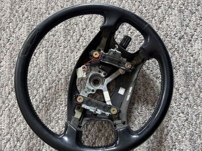 STEERING WHEEL FOR A 2000 4RUNNER USED FAIR
