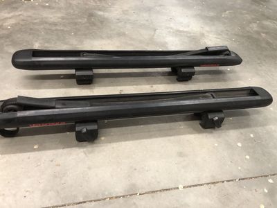 Yakima supdawg premium SUP surfboard rack paddle