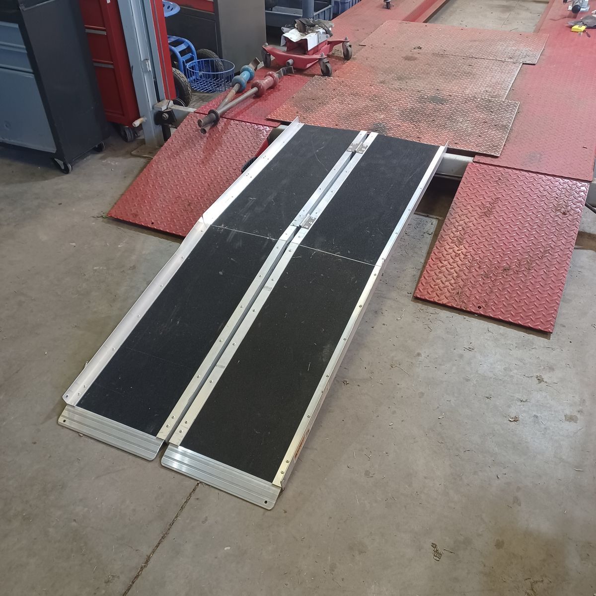 Portable wheelchair ramp