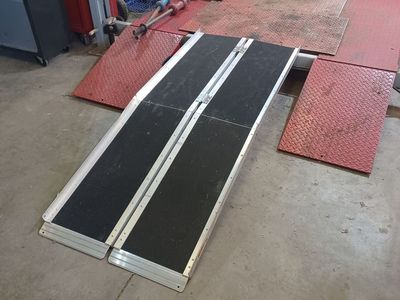 Portable wheelchair ramp
