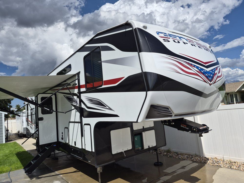 Genesis Supreme Toy Hauler Fifth Wheel RV - Excellent Condition