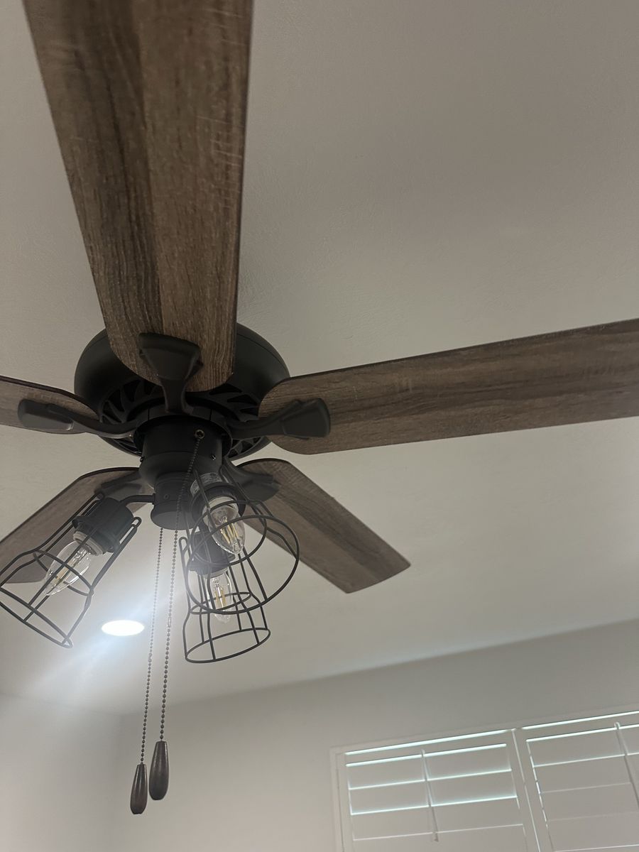 Industrial Ceiling Fan with Rustic Wood Blades and Cage Lights