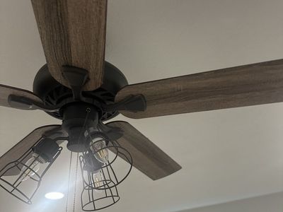 Industrial Ceiling Fan with Rustic Wood Blades and Cage Lights